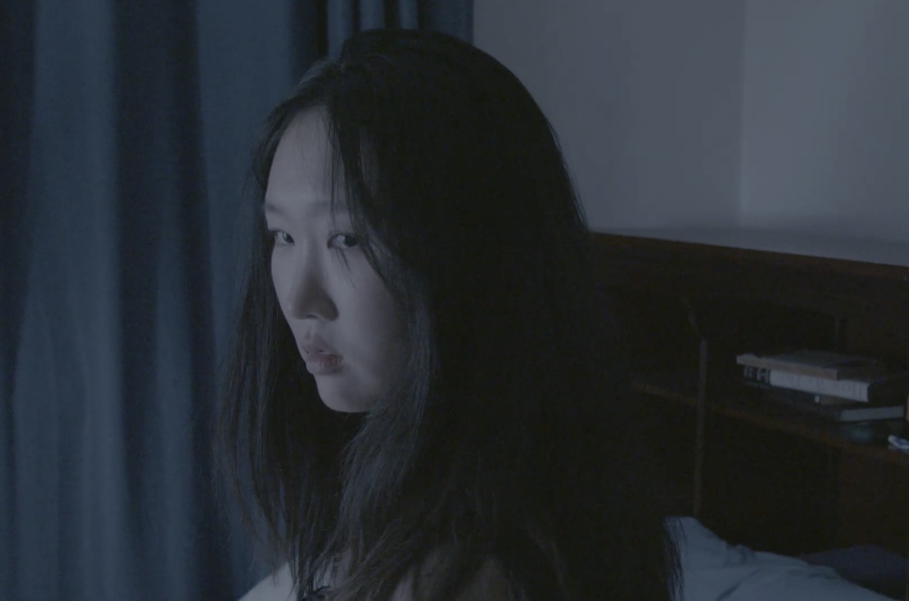 River Haeun Lee in a production still from Somewhere Here